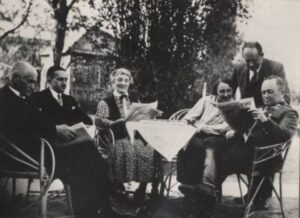 Family at the table in the garden