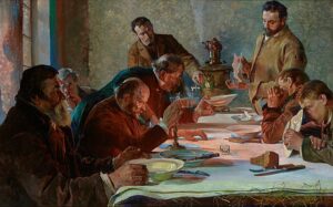 Na obrazie widać grupę mężczyzn siedzących za stołem i jedzących.