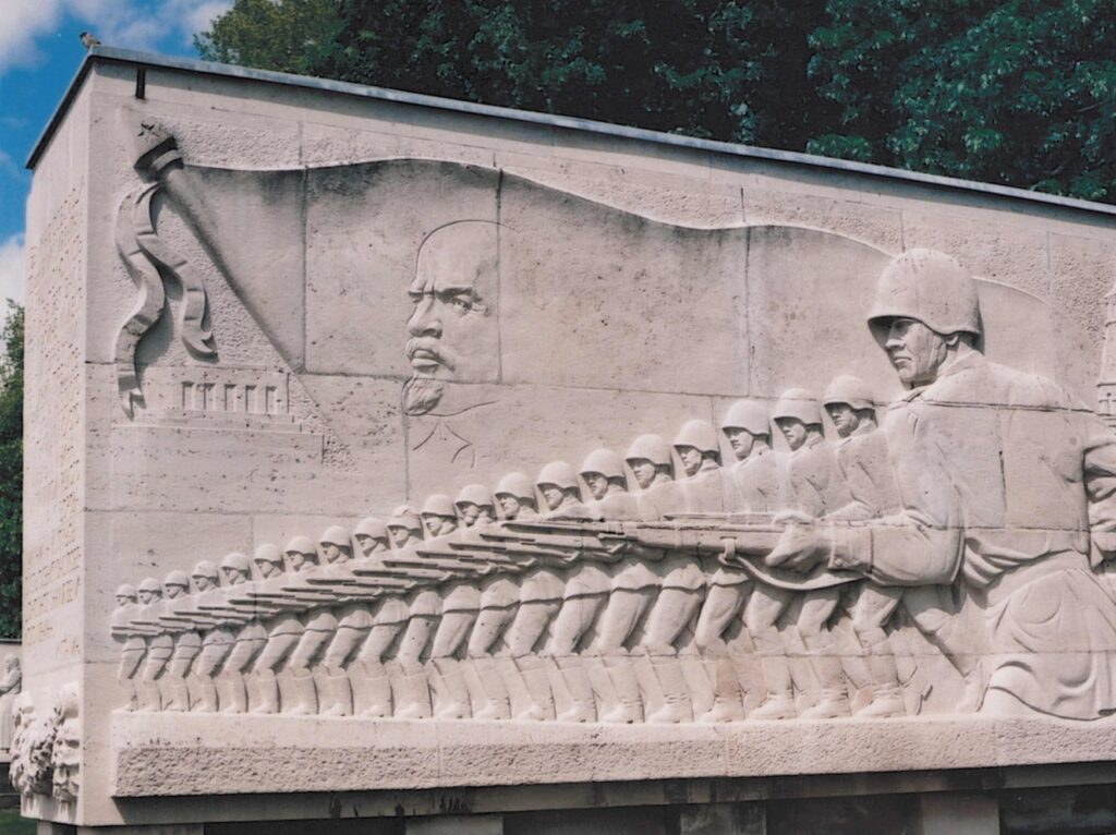 A bas-relief depicting soldiers marching into battle